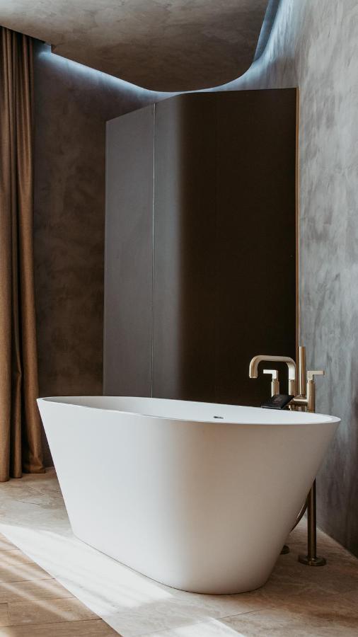The Veil Hotel Akmola Esterno foto A modern freestanding bathtub