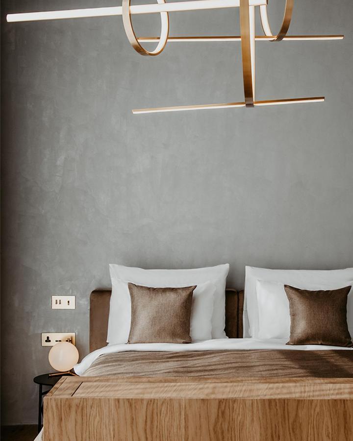 The Veil Hotel Akmola Esterno foto A wall mounted light
